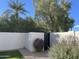 Private backyard access through modern metal gate at 9448 N 80Th Pl, Scottsdale, AZ 85258