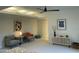 Bright bedroom with two armchairs and a modern console table at 9448 N 80Th Pl, Scottsdale, AZ 85258