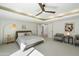 Bright bedroom with ceiling fan and access to another room at 9448 N 80Th Pl, Scottsdale, AZ 85258