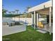 Outdoor patio with seating area and view of pool at 9448 N 80Th Pl, Scottsdale, AZ 85258