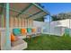 Relaxing pergola with seating and colorful cushions at 9448 N 80Th Pl, Scottsdale, AZ 85258