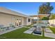 Inviting pool area with artificial turf and lounge chairs at 9448 N 80Th Pl, Scottsdale, AZ 85258