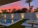 Relaxing pool area with sunset views and lounge chairs at 9448 N 80Th Pl, Scottsdale, AZ 85258