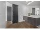 Double vanity bathroom with dark brown cabinets at 10222 E Southwind E Ln # 1026, Scottsdale, AZ 85262