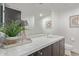 Vanity with dark brown cabinets and marble countertop at 10222 E Southwind E Ln # 1026, Scottsdale, AZ 85262