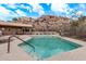 Community pool and spa area with mountain backdrop at 10222 E Southwind E Ln # 1026, Scottsdale, AZ 85262