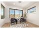 Relaxing sitting area with two armchairs and a view at 10222 E Southwind Ln # 1026, Scottsdale, AZ 85262