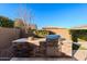 Outdoor kitchen with built-in grill and countertop at 10434 E Texas Ave, Mesa, AZ 85212