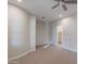 Spacious bedroom with ceiling fan and walk-in closet at 10434 E Texas Ave, Mesa, AZ 85212