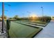 Well-maintained bocce ball court in a sunny area at 10434 E Texas Ave, Mesa, AZ 85212