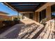 Covered patio with pergola and brick pavers at 10434 E Texas Ave, Mesa, AZ 85212