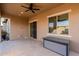 Covered patio with tile flooring and storage bench at 10434 E Texas Ave, Mesa, AZ 85212