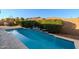 Resort-style pool with water features and plenty of space to relax at 10434 E Texas Ave, Mesa, AZ 85212