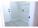 Laundry area with shelving and hookups at 10549 E Flossmoor Ave, Mesa, AZ 85208