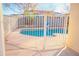 Inviting swimming pool with safety fence at 10549 E Flossmoor Ave, Mesa, AZ 85208