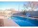 Refreshing pool with basketball hoop at 10549 E Flossmoor Ave, Mesa, AZ 85208