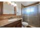 Updated bathroom with granite vanity and a shower at 10615 N 102Nd Dr, Sun City, AZ 85351