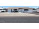 House exterior, white brick ranch with small front yard at 10615 N 102Nd Dr, Sun City, AZ 85351