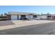 Front view of a ranch style home with a driveway at 10615 N 102Nd Dr, Sun City, AZ 85351