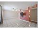 Living room with tile floors and a view of the kitchen at 10615 N 102Nd Dr, Sun City, AZ 85351