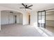 Primary bedroom with walk in closet and barn door at 10811 E Contessa St, Mesa, AZ 85207