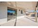 Covered patio with sliding glass doors to the pool at 10811 E Contessa St, Mesa, AZ 85207