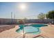 Relaxing kidney-shaped pool in a sunny backyard at 10811 E Contessa St, Mesa, AZ 85207