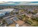 Aerial view showing a new build home's location near a main road and other houses at 10869 N 81St Ave, Peoria, AZ 85345