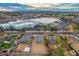 Aerial view of two new construction homes near a large commercial building at 10869 N 81St Ave, Peoria, AZ 85345