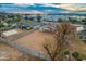 Aerial view of a new construction home with a large backyard and surrounding neighborhood at 10869 N 81St Ave, Peoria, AZ 85345