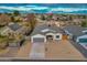 New construction home with a two-car garage and large lot at 10869 N 81St Ave, Peoria, AZ 85345