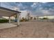 Large backyard with covered patio and block wall at 10869 N 81St Ave, Peoria, AZ 85345