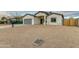 Newly built home with gray garage door and neutral exterior at 10869 N 81St Ave, Peoria, AZ 85345