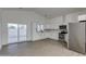 Modern kitchen featuring white cabinets and stainless steel appliances at 10869 N 81St Ave, Peoria, AZ 85345