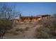 Home's backyard features a large patio and stunning views at 11105 E Tamarisk Way, Scottsdale, AZ 85262