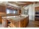 Gourmet kitchen with large island and granite counters at 11105 E Tamarisk Way, Scottsdale, AZ 85262