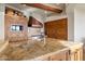 Kitchen with granite countertops and wooden cabinetry at 11105 E Tamarisk Way, Scottsdale, AZ 85262