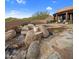 Landscaped water feature with natural stone at 11105 E Tamarisk Way, Scottsdale, AZ 85262