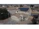 Two-story house with solar panels and a spacious backyard at 11534 W Longley Ln, Youngtown, AZ 85363