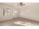 Bright bedroom with tile floors and ceiling fan at 11686 N Spotted Horse Way, Fountain Hills, AZ 85268