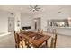 Bright dining area with a large, ornate wooden table at 11686 N Spotted Horse Way, Fountain Hills, AZ 85268