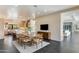 Open concept dining area with kitchen view and modern decor at 12201 N 65Th St, Scottsdale, AZ 85254