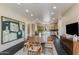 Bright dining area with wood table and chairs, adjacent to kitchen at 12201 N 65Th St, Scottsdale, AZ 85254