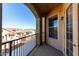 Private balcony overlooking community; access from living area at 14575 W Mountain View Blvd # 12303, Surprise, AZ 85374