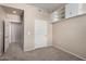 Well-lit bedroom with an additional closet at 14575 W Mountain View Blvd # 12303, Surprise, AZ 85374