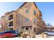 Residential building exterior showcasing architectural details and parking at 14575 W Mountain View Blvd # 12303, Surprise, AZ 85374