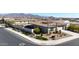 Single-story home with desert landscaping, driveway and garage at 15207 S 183Rd Ave, Goodyear, AZ 85338