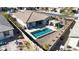 Aerial view of house with pool and backyard at 15207 S 183Rd Ave, Goodyear, AZ 85338