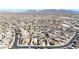 Neighborhood overview with distant mountains at 15207 S 183Rd Ave, Goodyear, AZ 85338