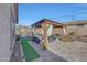 Relaxing backyard patio with gazebo, seating area, and artificial turf at 15207 S 183Rd Ave, Goodyear, AZ 85338